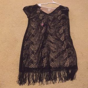 Black dress with beige under slip